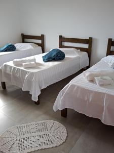 Postel nebo postele na pokoji v ubytování Pousada Cipó Paraty