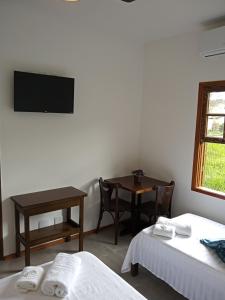Postel nebo postele na pokoji v ubytování Pousada Cipó Paraty