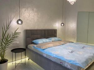 Posteľ alebo postele v izbe v ubytovaní Panorama Luxury Apartment in The House with a Spire, a historical building in the city centre