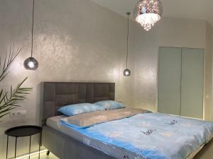 Posteľ alebo postele v izbe v ubytovaní Panorama Luxury Apartment in The House with a Spire, a historical building in the city centre