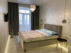 Posteľ alebo postele v izbe v ubytovaní Panorama Luxury Apartment in The House with a Spire, a historical building in the city centre