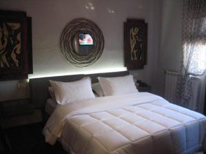 Letto o letti in una camera di Drini Hotel