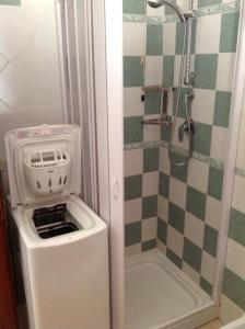 Ένα μπάνιο στο Residence Mare Sol Appartamento in affitto Budoni