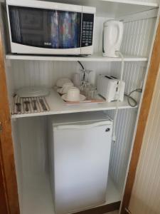 Kuchyň nebo kuchyňský kout v ubytování Eko Cozy Guest House