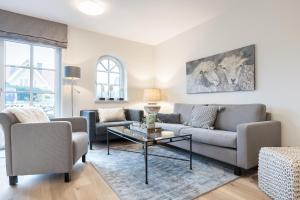 Posezení v ubytování Strandgut Wohnung 5