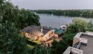 an aerial view of a boat on a river at Mini hotel Gavan Nadiezhdy in Zhukovsky