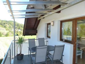 A balcony or terrace at Ferienhaus Blümel inkl. freier Strandbadeintritt