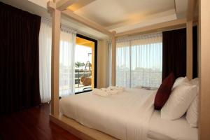 Кровать или кровати в номере Keeree Ele Resort