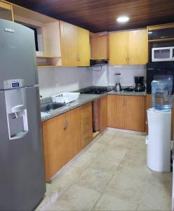 Kuchyň nebo kuchyňský kout v ubytování Apartamento Tu Casa en el Mar