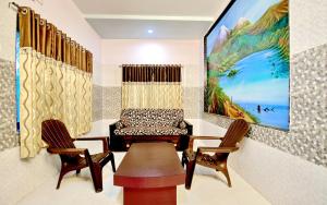 Hotel Anil Farmhouse Gir Jungle Resort的休息区