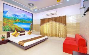 TV i/ili multimedijalni sistem u objektu Hotel Anil Farmhouse Gir Jungle Resort