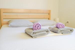 Postel nebo postele na pokoji v ubytování Seasidelongo Houses 1 min from the beach of Nikiti