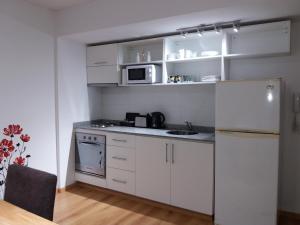 Een keuken of kitchenette bij Kalahat II