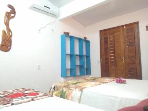 Cama ou camas em um quarto em Suíte's Damar - Icaraizinho