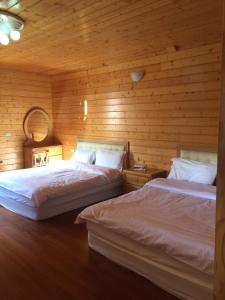 Letto o letti in una camera di Yun Hsiang Zhan Chalet