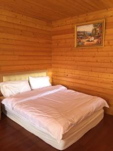 Letto o letti in una camera di Yun Hsiang Zhan Chalet