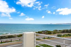 a view of the ocean from a balcony at THE LIDO BEACH FRONT in Port Elliot