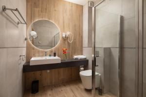 Kúpeľňa v ubytovaní Sziget Hotel