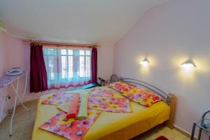 A bed or beds in a room at Fener Guest House