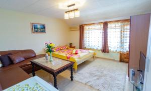 A bed or beds in a room at Fener Guest House