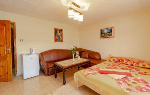 A bed or beds in a room at Fener Guest House
