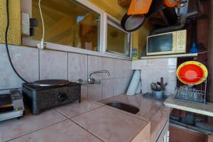 A kitchen or kitchenette at Fener Guest House