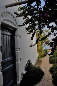 A garden outside Pambelos Lodge