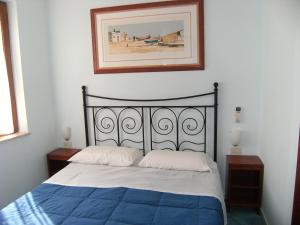 Postel nebo postele na pokoji v ubytování Blu Mare