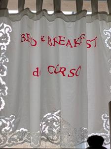 a curtain with the words bad breath a car so on it at B&B del Corso Altamura in Altamura