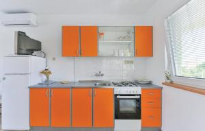 Kuchyň nebo kuchyňský kout v ubytování Apartmani Vugec, Povljana - Pag + 25 fotografií