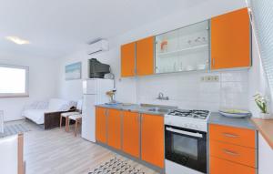Kuchyň nebo kuchyňský kout v ubytování Apartmani Vugec, Povljana - Pag