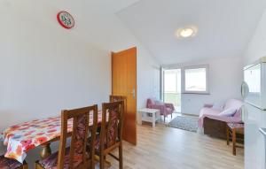 Postel nebo postele na pokoji v ubytování Apartmani Vugec, Povljana - Pag