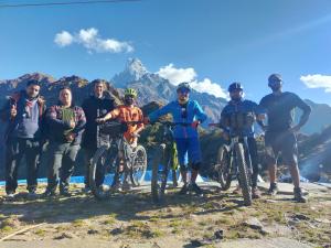 a group of people on bikes on a mountain at Pokhara Youth Hostel in Pokhara