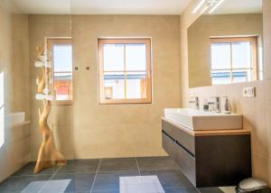 Koupelna v ubytování Schitter-Appartements + 45 fotografií