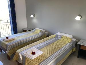 A bed or beds in a room at Banos Apartments and swimming pool