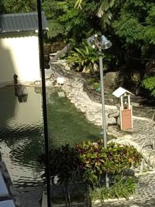 Aed väljaspool majutusasutust Zhiben hotspring Heping Guesthouse