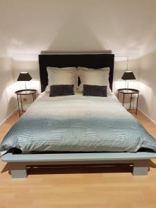 Postel nebo postele na pokoji v ubytování De achtertuin