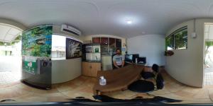 a room with a slide in the middle of a room at Pousada do Joca Bonito/MS in Bonito