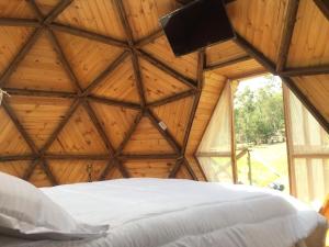 Postel nebo postele na pokoji v ubytování Glamping/BBQ Susa Cun