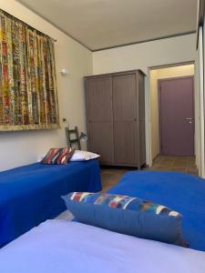 A bed or beds in a room at ARTISTICO - Artistic flat in front of GUGGENHEIM COLLECTION