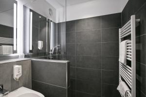 Koupelna v ubytování Hotel-Gasthaus Engel Luttingen + 28 fotografií