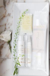 a group of products in a white box with a flower at La Galería in Donostia-San Sebastián