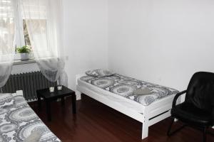 Łóżko lub łóżka w pokoju w obiekcie Dom Warszawa/Legionowo