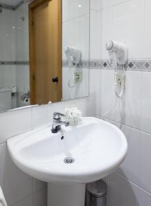 Koupelna v ubytování Hotel Monte Ulia