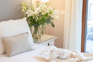 Postel nebo postele na pokoji v ubytování Hotel Monte Ulia