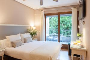 Cama o camas de una habitación en Hotel Monte Ulia