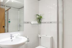 Koupelna v ubytování Hotel Monte Ulia