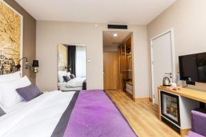 Postel nebo postele na pokoji v ubytování The Halich Hotel Istanbul Karakoy - Special Category