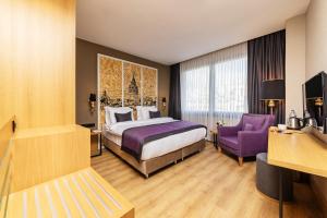 Postel nebo postele na pokoji v ubytování The Halich Hotel Istanbul Karakoy - Special Category