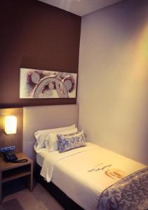 Prestige Hotel & Spa客房内的一张或多张床位